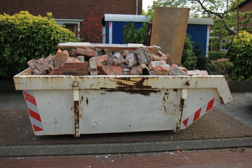 Professional furniture clearance team removing items from a home